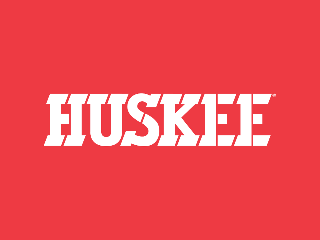 Huskee logo on brand color background